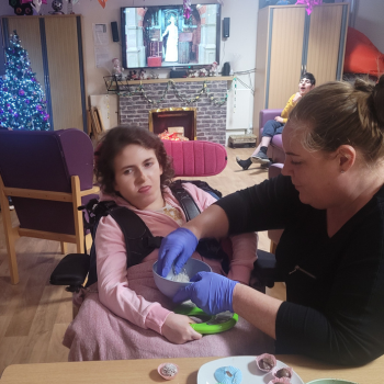 Young female participating in sensory activity